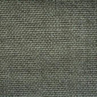 Stone-washed linen fabric texture features a repeating nubby pattern in grey-green, with a dense weave and visible product label “523”.