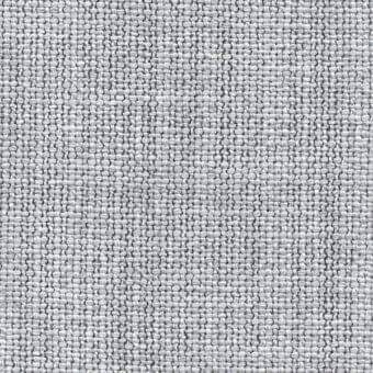 Woven gray fabric texture displaying a dense, consistent pattern of intersecting threads with a matte finish and granular appearance.