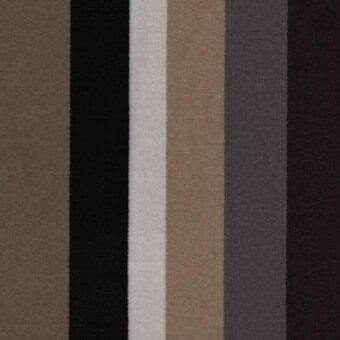 Textile sample with vertical stripes of beige, black, white, tan, gray, and brown fabrics, displaying a brushed texture and neutral earthy tones.