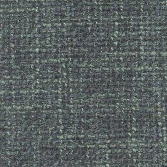 Woven fabric sample, muted green and gray, dense irregular texture with matte finish; “col 25 vert clair” designation.