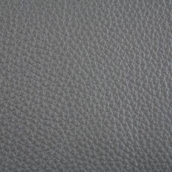 Gray leather texture with repeating embossed pattern, resembling cayman skin, matte finish, consistent dye, durable tactile quality.