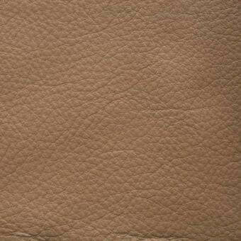 Leather texture sample, tan pebble-grain, matte finish, displaying subtle tonal variations and a dense network of irregular bumps and creases.