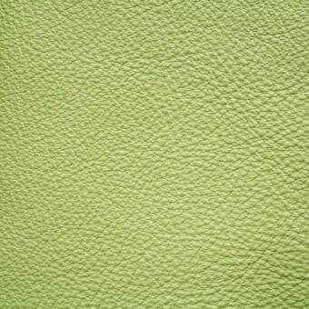 Lime pebble-grain leather texture with repeating rounded bumps, subtle creases, and a smooth, glossy surface; ascot leather sample.