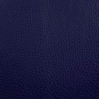 Blue leather texture with a granular, pebbled surface and repeating bump pattern; matte finish, crystal blue from erba leather collection.