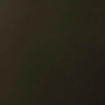 Dark brown leather texture with subtle grain, matte finish, and diffuse lighting creating tonal depth from top to bottom.