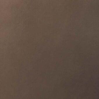 Warm brown leather texture with a consistent fine grain and matte finish, presented as a solid, seamless surface under diffused lighting.
