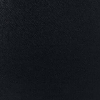 Black leather texture displaying a mottled grain pattern, matte finish, and subtle tonal variations against a neutral backdrop.