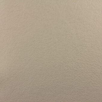 Beige leather swatch displaying a natural grain pattern, with a matte finish and a small perforation; labeled “erba tosca 636”.