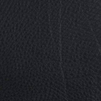 Piumone Nero leather texture, matte black finish, densely pebbled grain, soft and pliable surface, consistent dye, treated leather sheen.