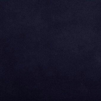 Stonewash blue leather swatch displaying a textured surface, subtle grain, and mottled tone; matte finish suggests durability.