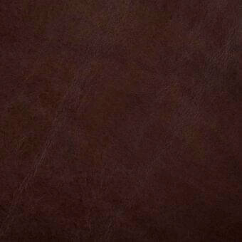Stonewash red brown leather texture with distressed, mottled surface; matte finish shows irregular lines and creases for a rustic aesthetic.