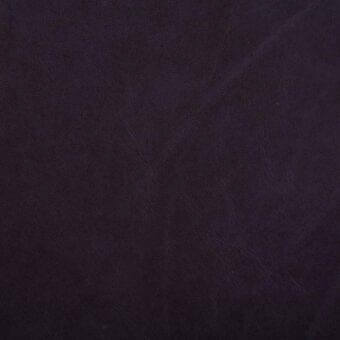 Dark wine leather texture with stonewash finish, displaying a distressed grain and matte surface with subtle creasing.