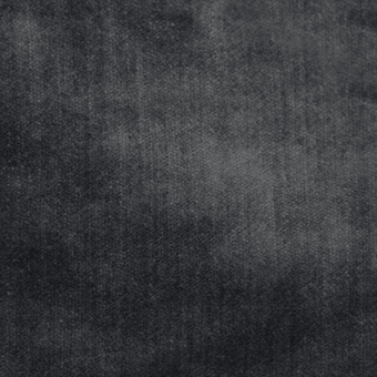 Dark gray granular texture, mottled surface with subtle shading variations, matte finish, resembling distressed fabric or paper, Formitalia “Cloud” textile.