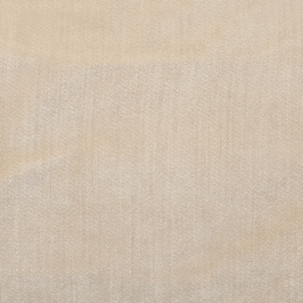 Panna fabric texture with a short, dense pile and subtle weave displaying a muted sheen and warm, neutral tone.