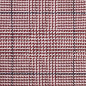 Prince of Wales check textile with red, off-white, and gray woven in a grid pattern; structured classic fabric sample.