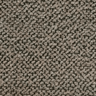 Textured fabric sample in muted gray-brown with a dense, grid-like pattern of looped elements, revealing a darker woven base and “formitalia” label.