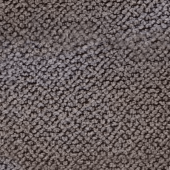 Mottled gray texture composed of tightly clustered, spherical elements, exhibiting a granular surface and matte finish with diffused lighting.