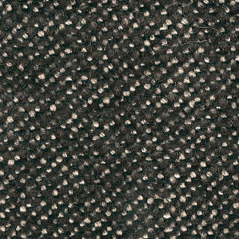 Textured fabric sample with a dense, speckled pattern in dark brown and beige, displaying a repeating circular dot motif and matte finish.