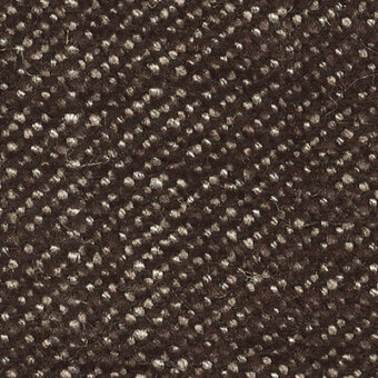 Woven fabric sample, brown and cream, with a dense diagonal grid pattern and raised circular texture; subtle text integrated within.