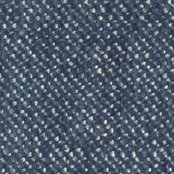 Dark blue fabric texture with a dense pattern of small, silvery-gray circular elements, woven construction, granular surface.