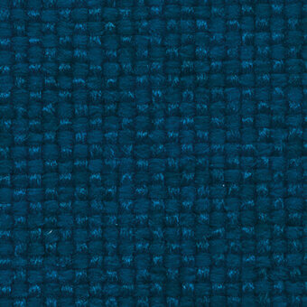 Teal woven fabric texture with a geometric square pattern, accented by lighter blue threads, displaying a product label with category details.
