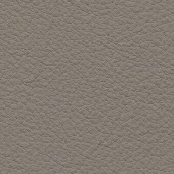 Chamois leather texture, muted gray-brown, dense irregular pebbled pattern, matte finish, granular quality, soft pliable surface.