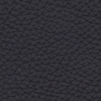 Dark grey quilted leather texture, “Raffaello” in “Atlantic Grey 218”, displays a repeating geometric pattern with a matte, subtly pebbled surface.