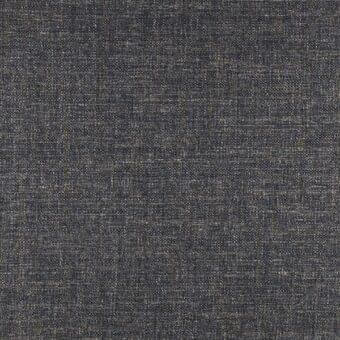 Charcoal gray woven fabric texture with heathered beige threads, plain weave construction, matte finish, and printed label detail.
