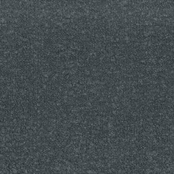 Dark gray fabric texture with a dense, granular surface composed of small, irregular particles and a uniform, matte finish.