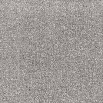 Granular gray texture composed of irregular particles, creating a speckled, matte surface with subtle tonal variations and uniform density.