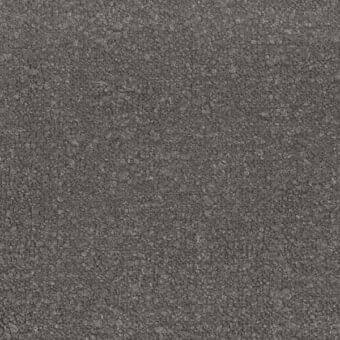 Dark gray aggregate texture with a mottled appearance, displaying uniformly distributed, irregularly shaped particles and a matte finish.
