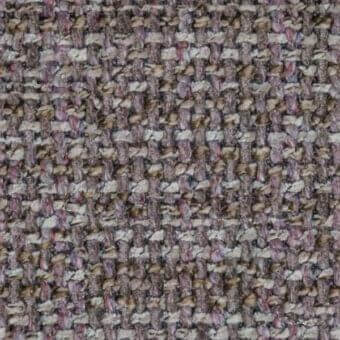 Giorgetti tweed fabric texture, beige and brown with lavender, displaying a dense, irregular weave and “Daydreamer” label.