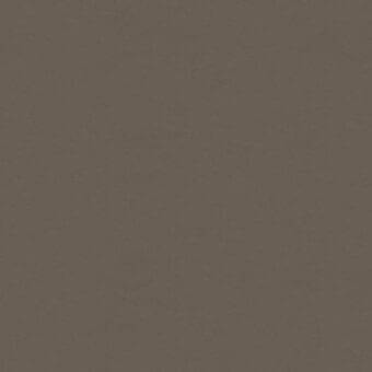Giorgetti fabric swatch in muted brown with a matte, woven texture; label displays “tx duchessa 5251 roccia wr” identifying collection details.