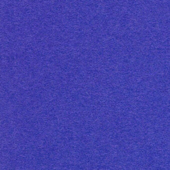 Indigo blue textile surface with a short, dense pile and subtle grain, showcasing Kvadrat Divina3 0782 fabric texture and consistent coloration.