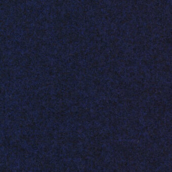 Deep blue textured surface with a dense, granular pile resembling fabric, displaying subtle tonal variations and a consistent, tactile finish.