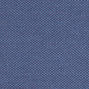 Kvadrat Steelcut Trio textile sample, navy and denim blue, densely patterned with raised circular elements and a tactile woven structure.