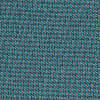 Teal Kvadrat Steelcut Trio fabric texture with a granular, woven pattern and dark gray threads; looped pile construction, studio lighting.