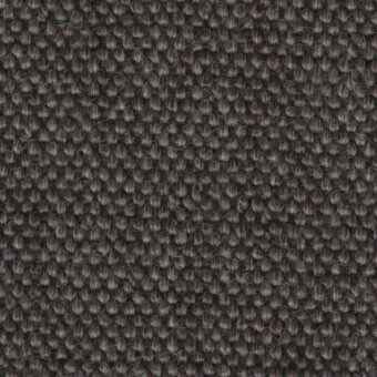 Gray and brown heathered texture with a dense, repeating pattern of rounded elements, resembling pebbles, suggesting a woven or looped construction.