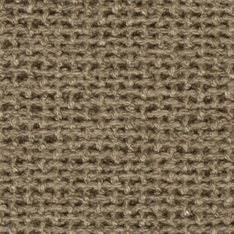 Coarse woven textile, muted brown tone, dense irregular pattern of horizontal and vertical threads creating a textured, slightly mottled surface.