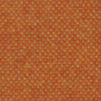 Textured fabric sample with a reddish-orange and golden-yellow speckled dot pattern, exhibiting a coarse woven texture and warm autumnal tones.
