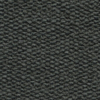 Textured fabric swatch in muted sable, displaying a dense, repeating nubby pattern with circular elements and a tightly woven granular texture.