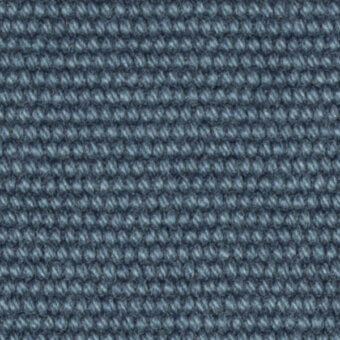 Woven texture sample in blue-gray, displaying a ribbed, linear pattern with densely packed cylindrical fibers and a consistent matte finish.