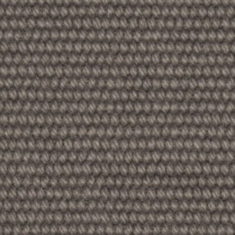 Ribbed fabric texture in muted gray-brown, displaying a consistent horizontal weave with slightly rounded strands and a dense, regular pattern.