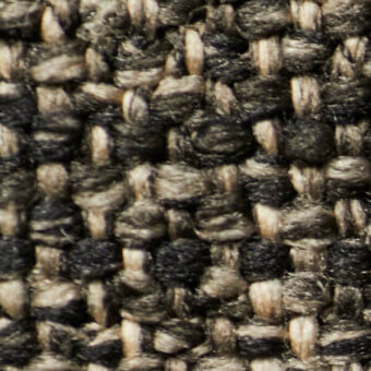Dense tweed-like fabric texture features charcoal gray and off-white beige yarns in an irregular, nubby weave with a heathered, speckled pattern.