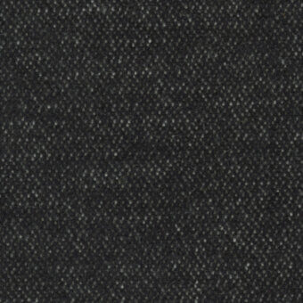 Charcoal gray woven textile with speckled fibers, exhibiting a matte finish and multi-directional, nubby weave pattern; likely wool or blend.