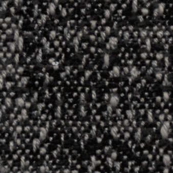 Dark charcoal gray woven fabric texture with speckled pattern, irregular loops, and visible fibers; label reads "horm > nuance v2 (superior) > fresia 3112 26".