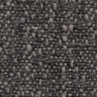 Woven fabric texture, muted gray-brown with beige and off-white flecks, coarse nubby weave with subtle vertical yarn pattern.