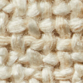 Off-white looped pile fabric texture with irregular loops, heathered yarn, and subtle tonal variations creating a plush, three-dimensional surface.