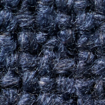 Blue-gray looped pile fabric texture with heathered effect, showing tight, irregular synthetic fiber loops and a nubby, felt-like surface.