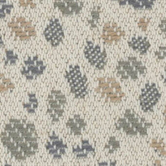 Cream textile pattern with repeating gray, olive, and tan geometric shapes resembling abstract leaves in a dense, textured weave.